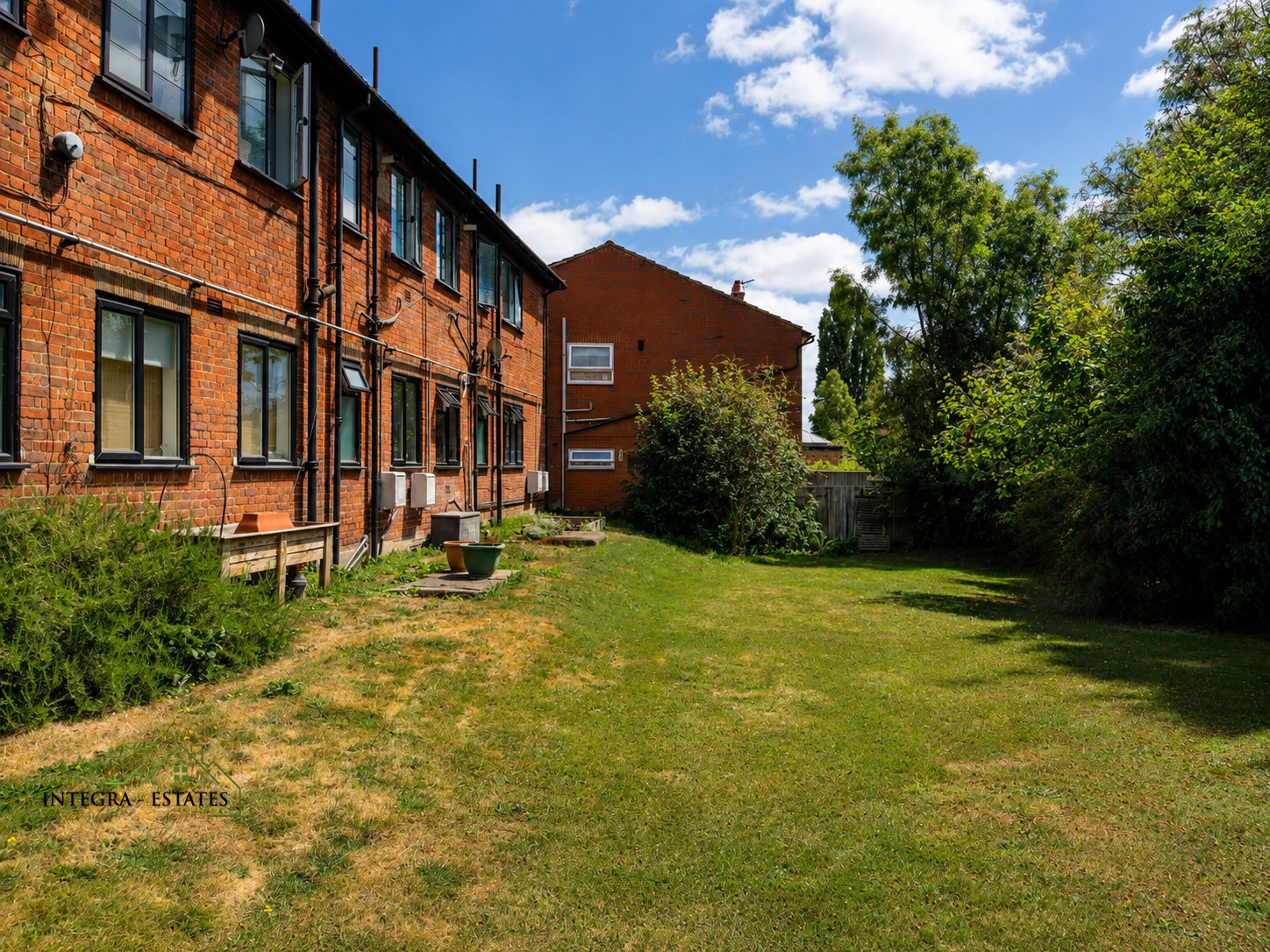 Communal gardens at Thorpe close Sydenham SE26, open space mainly laid to lawn.