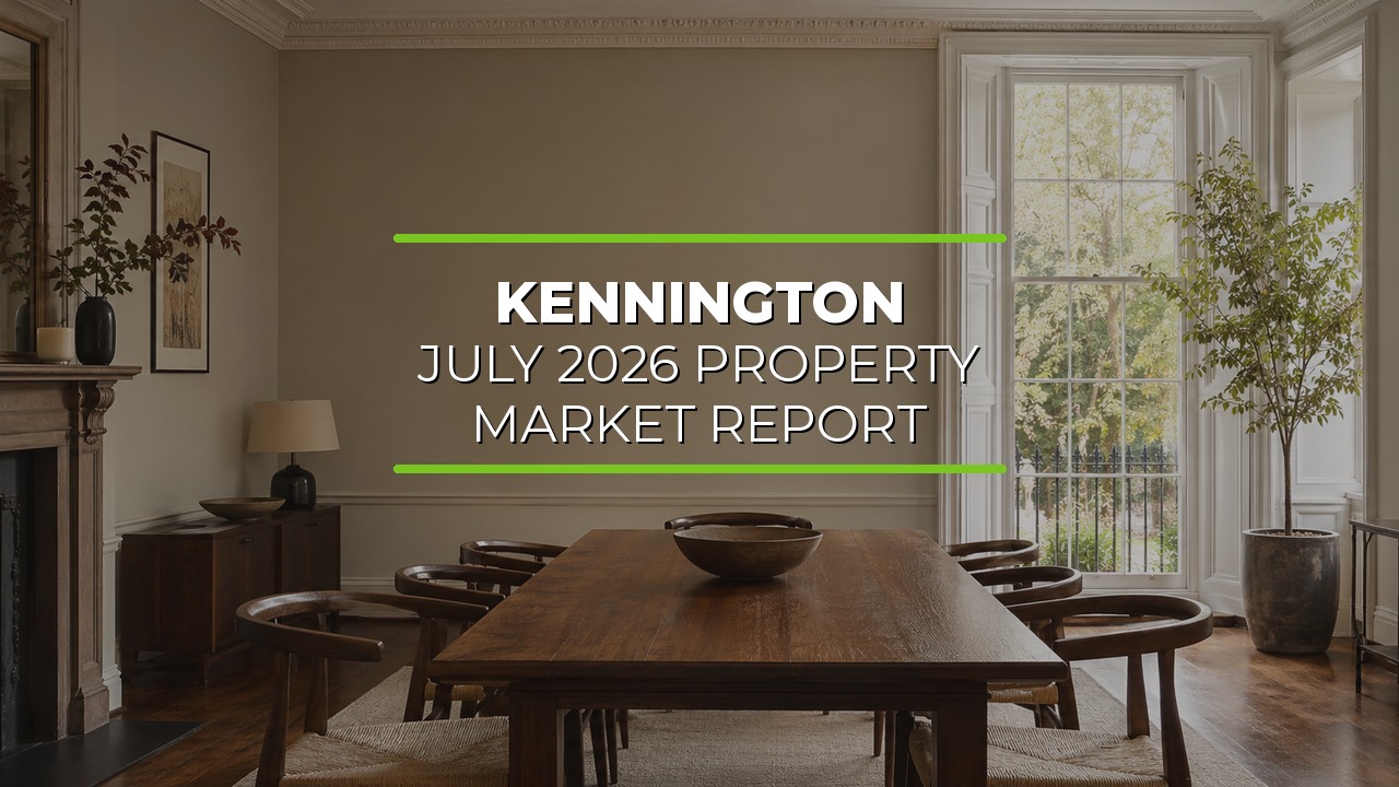 Elegant dining room with a large wooden table and chairs, fireplace on the left, and framed artwork on the walls. Tall windows on the right bring in natural light and reveal greenery outside. Overlaid text reads ‘Kennington July 2026 Property Market Report.’