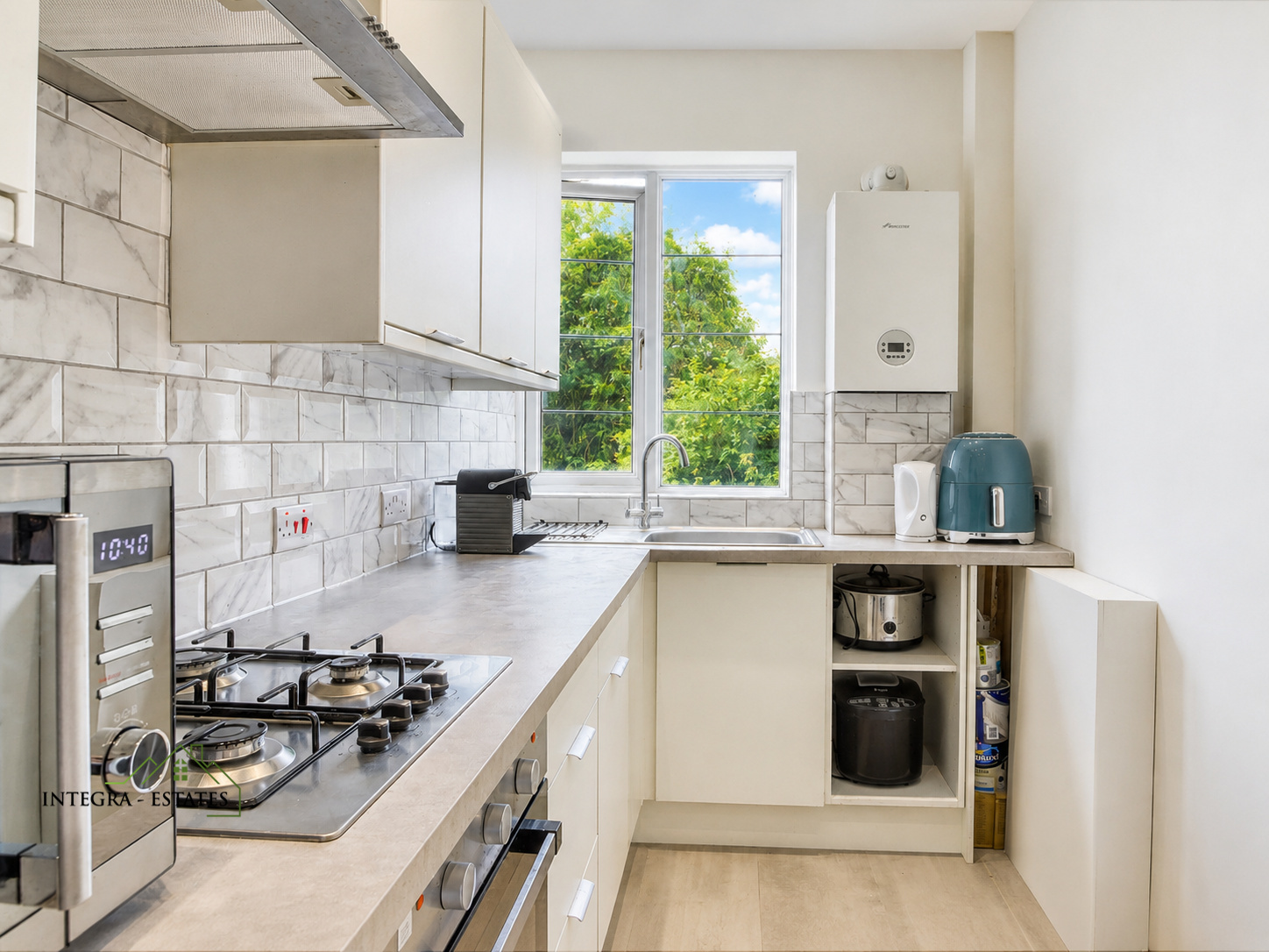 Modern Kitchen Thorpe close Sydenham SE26 with high and low level storage and ample counter top space.