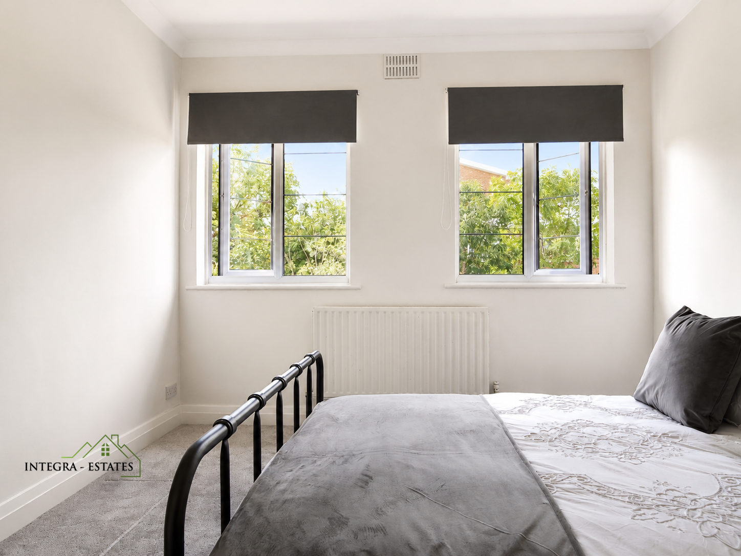 Spacious main bedroom within a top floor two bedroom flat on Thorpe Close in Sydenham