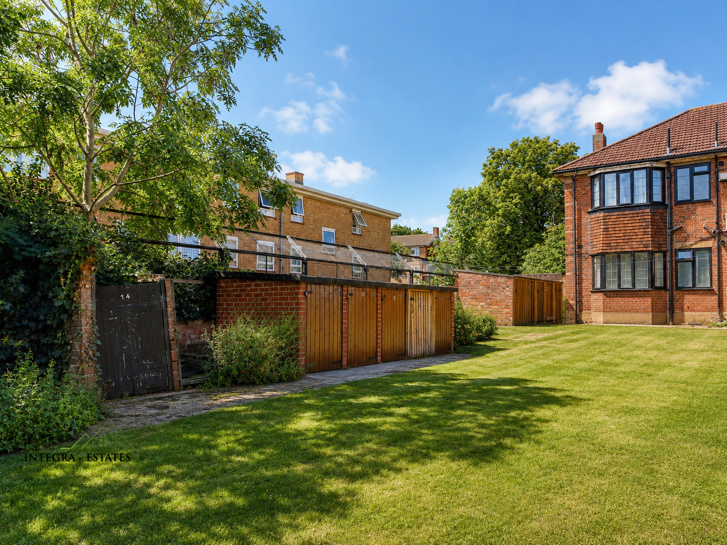 Thorpe close Sydenham communal gardens mainly laid to lawn but a beautiful open space.